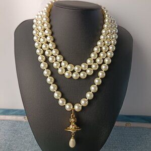 Vivienne Westwood Three Row Pearl Bas Relief Choker in Gold
